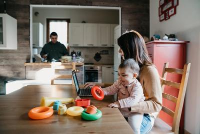 Woman with young child in kitchen - Ofgem 