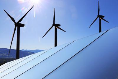 Solar panels with wind turbines