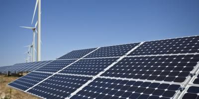 Solar panels on roof under a blue sky