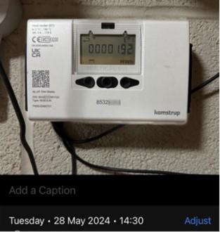 Example of a date-stamped meter photo submission example, showing the meter clearly along with the date and photo information menu at the bottom of the screenshot